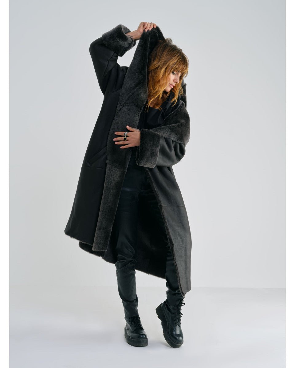 MANTEAU EN PEAU